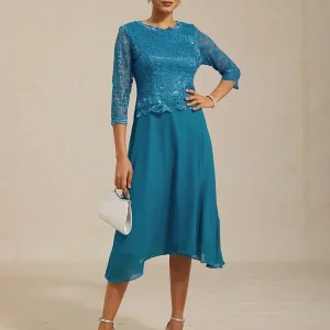 Vestido midi con encaje y manga tres cuartos