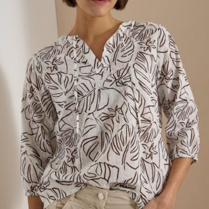 Blusa blanca hojas marrón