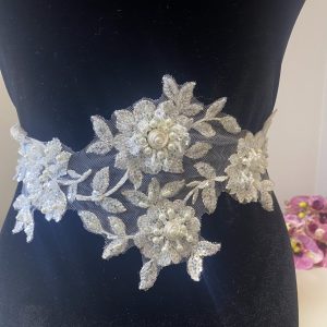 Aplicación vestido novia lentejuelas.