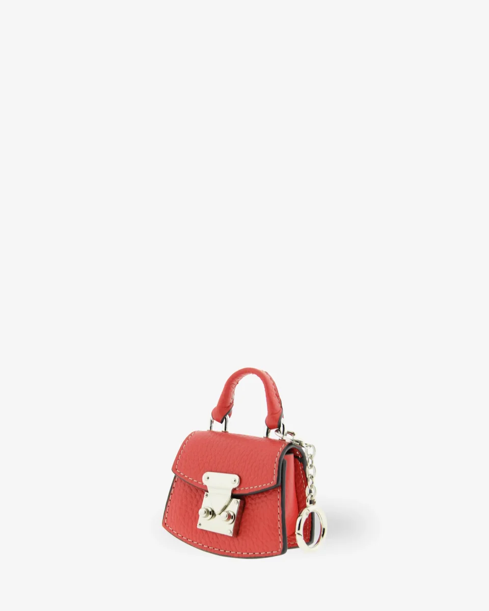 Nexo — Charm para bolso con funda para auriculares