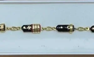 Pulsera de banderas oro de ley de 18 kts