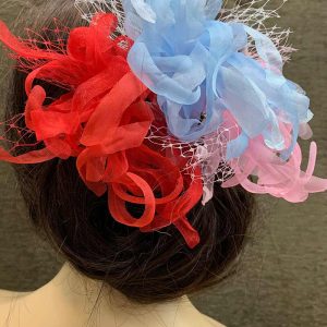 Prendido de colores para el cabello o para broche en chaqueta.