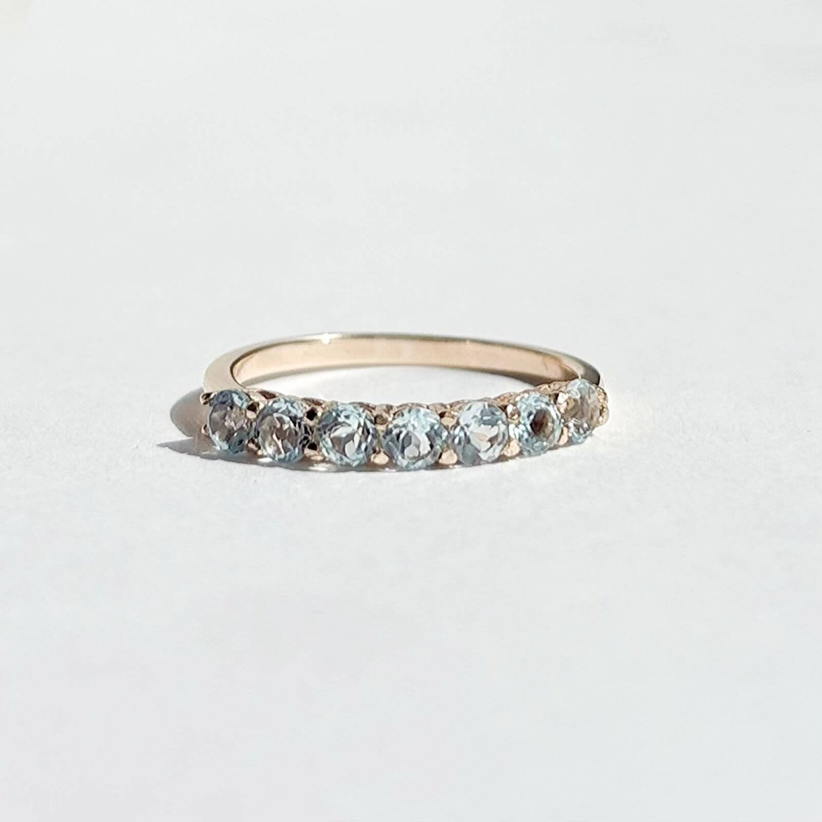 MEDIA CHURUMBELA EMMA TOPACIOS DE LA INDIA AZUL PASTEL 14K
